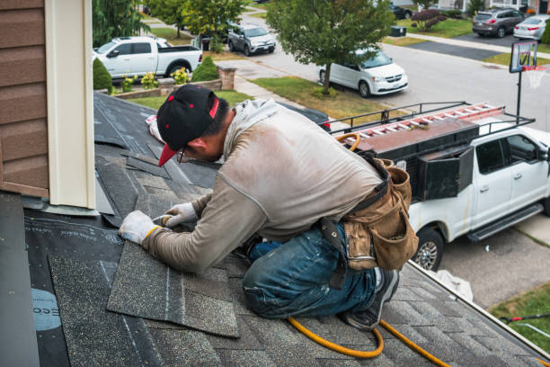 Professional Roofing technician working in Janesville, IA